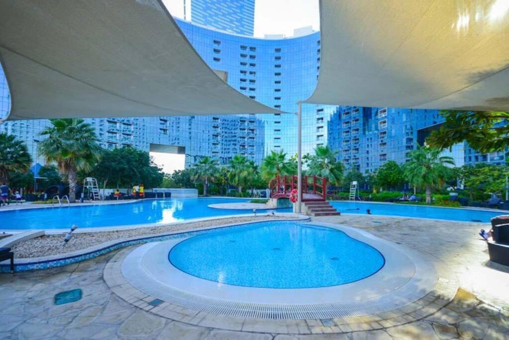 شقة Cozy 1Br In Iconic Tower أبو ظبي المظهر الخارجي الصورة